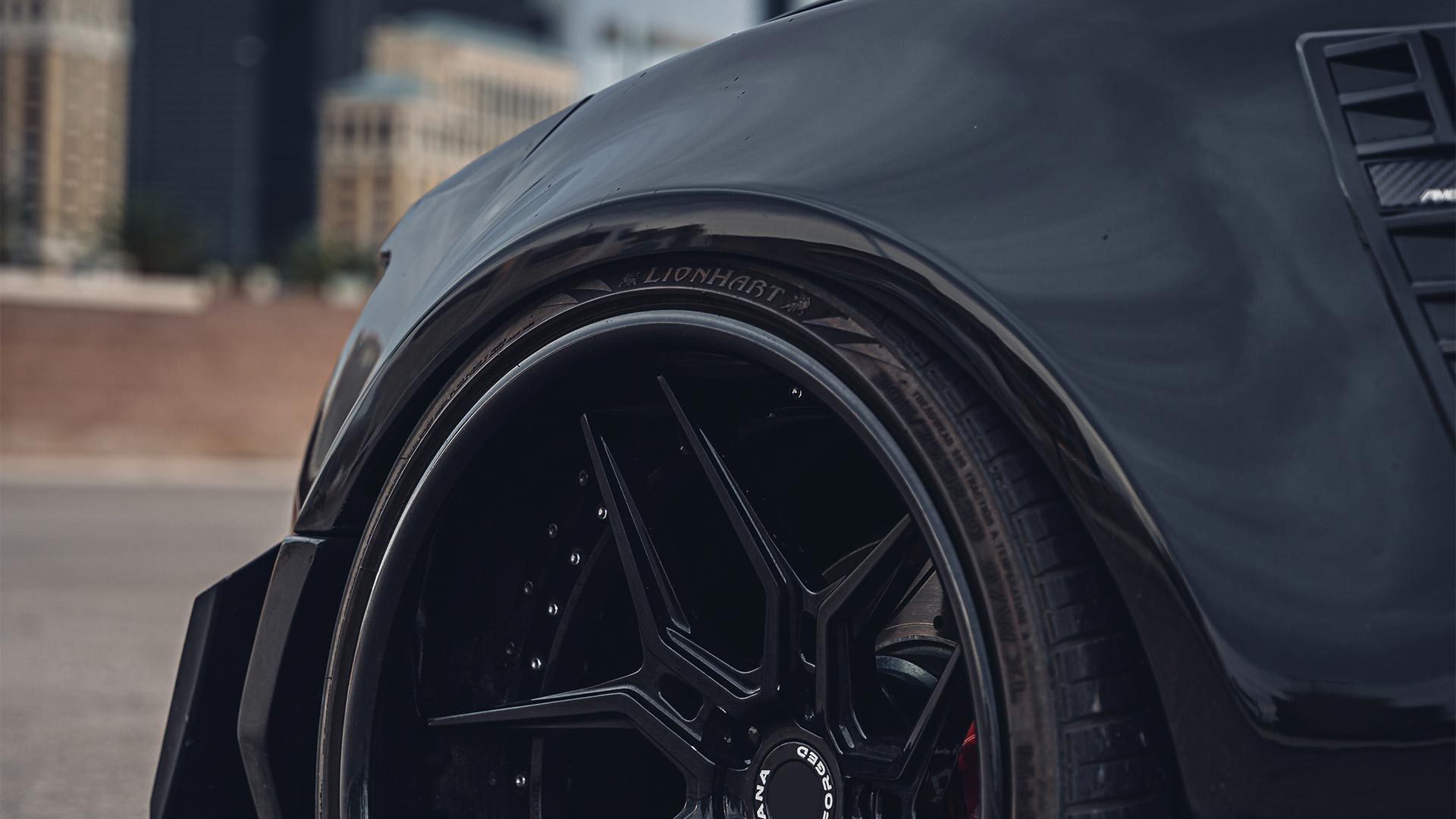 Image of a black Chevrolet Camaro with Lionhart Tires