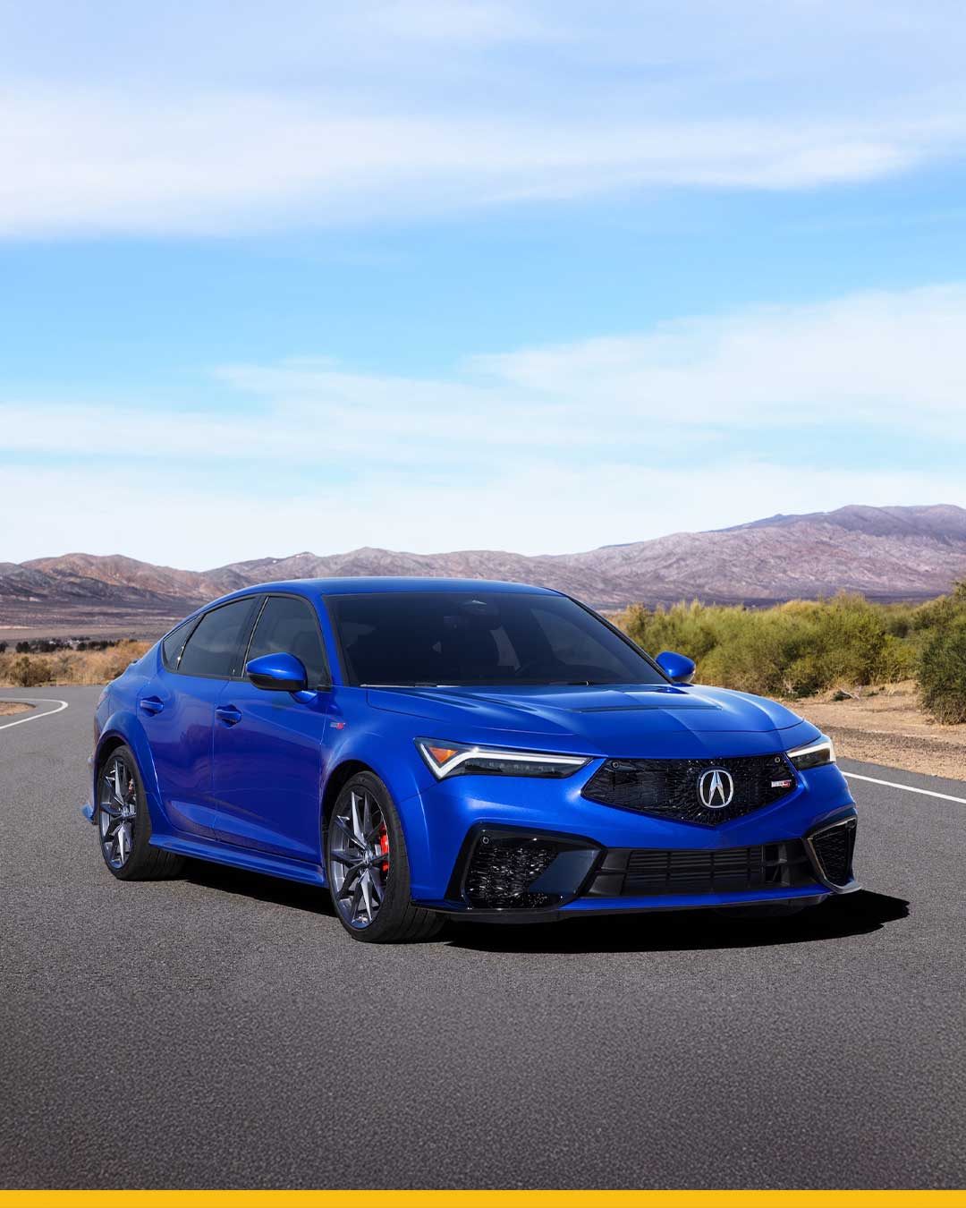 blue acura integra type s de on paved road in desert